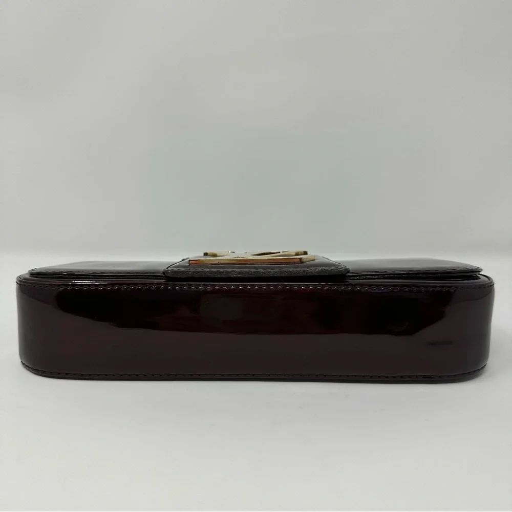 Louis Vuitton Dark Burgundy Clutch with Gold Logo